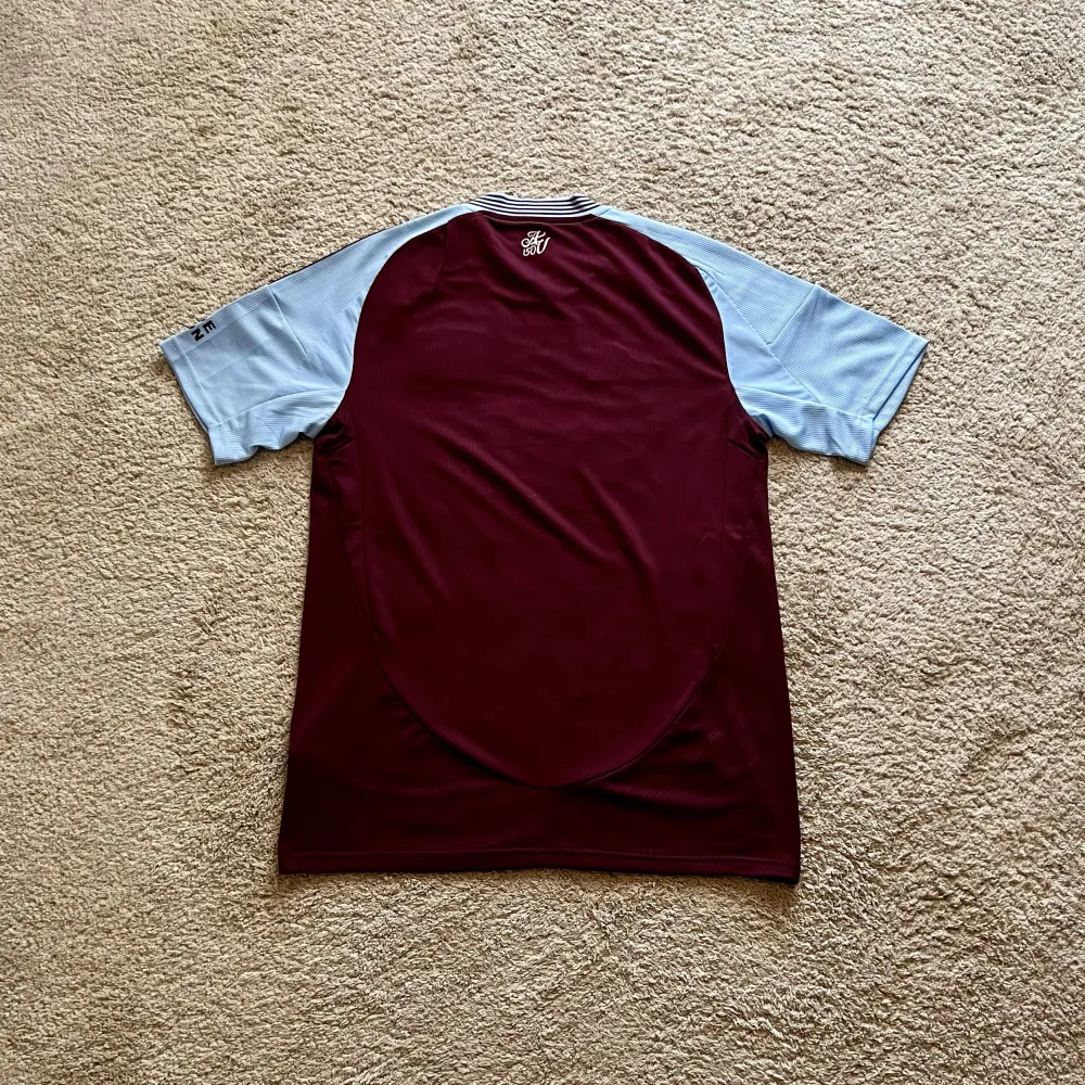 Rear view of Aston Villa 2024/25 Adidas Home Shirt (Betano) - Men's Medium
