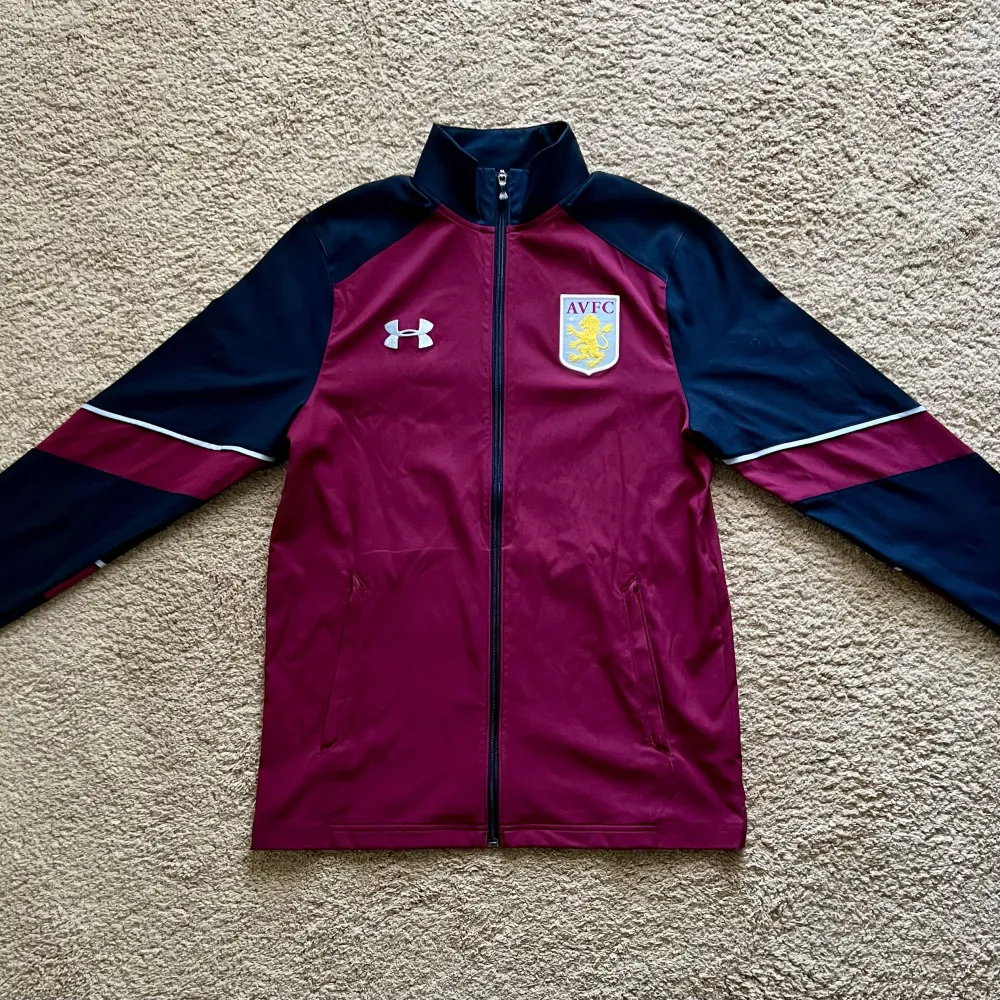 Front view of Aston Villa 2016/17 Under Armour 1 Track Shirt - Men's Medium
