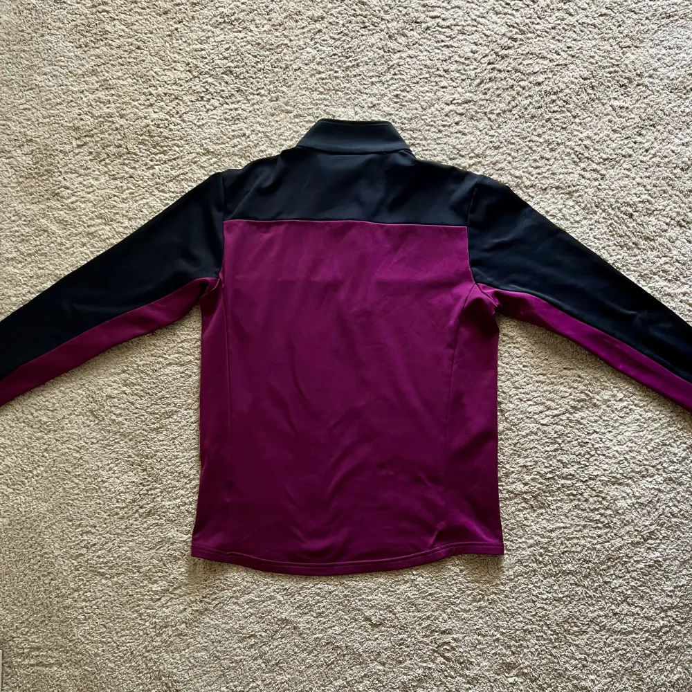 Rear view of Aston Villa 2018/19 Luke 1977 1 Track Shirt - Men's Medium