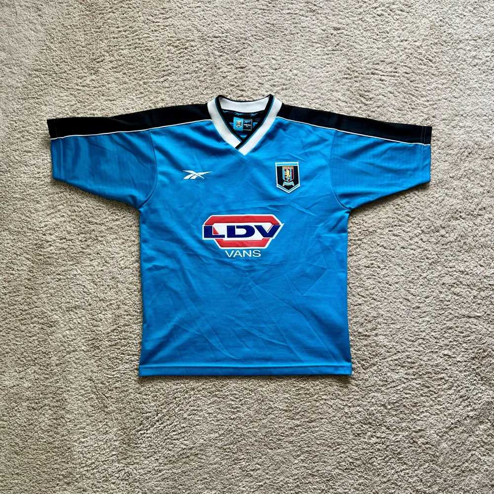 Front view of Aston Villa 1999/00 Reebok 3rd Shirt (LDV Vans) - Men's Small