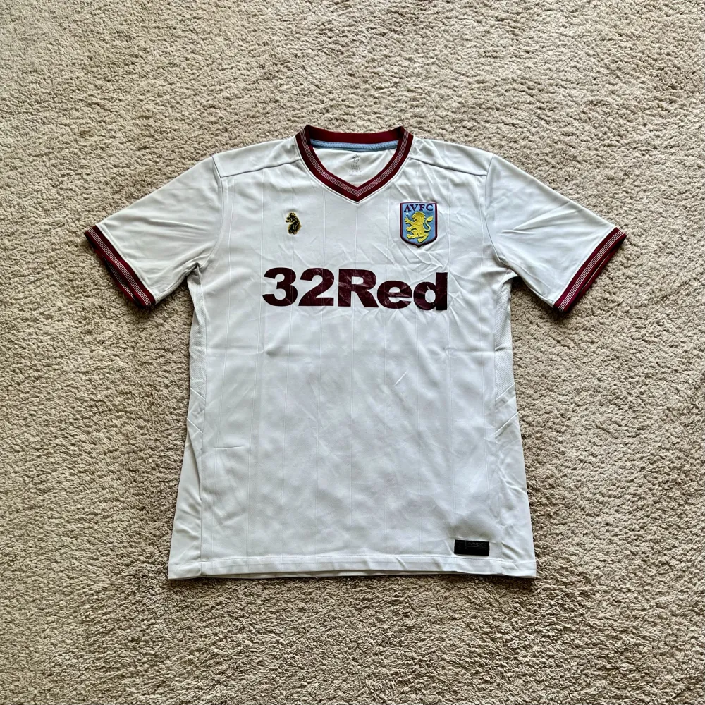 Front view of Aston Villa 2018/19 Luke 1977 Away Shirt (32Red) - Men's Medium