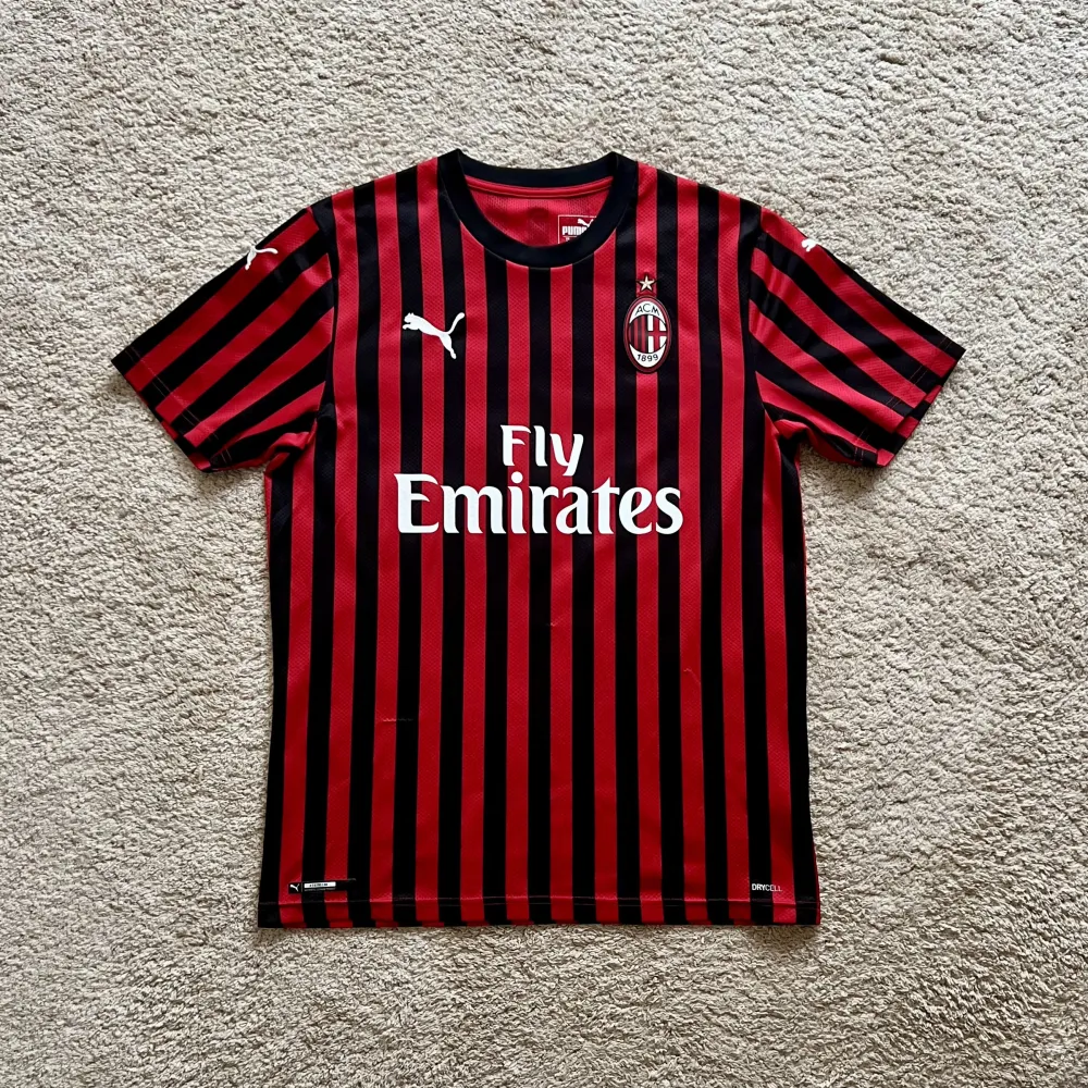 Front view of AC Milan 2019/20 Puma Home Shirt (Fly Emirates) - Men's Medium