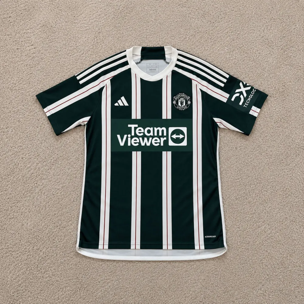 Front view of Manchester United 2023/24 Adidas Away Shirt - Men's Medium