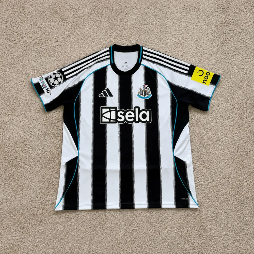 Front view of Newcastle United 2025/26 Adidas Home Shirt (Sela) - Men's XXL