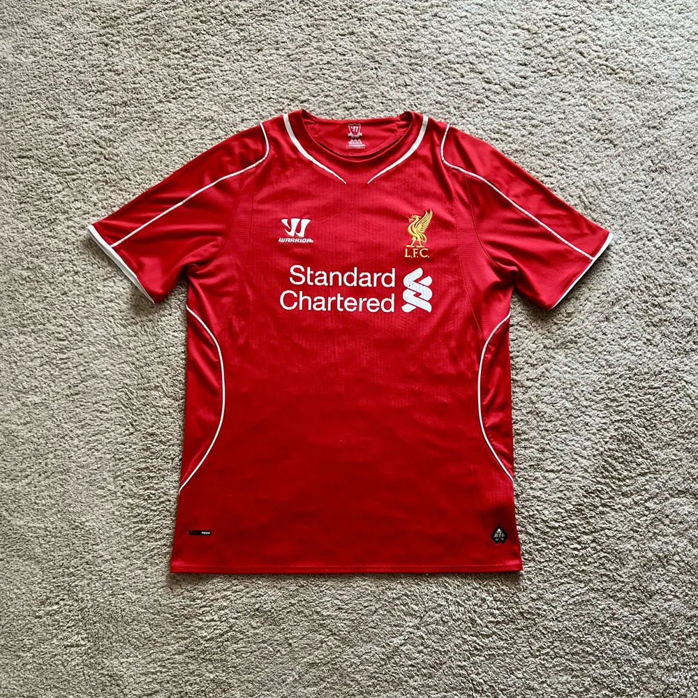 Front view of Liverpool 2014/15 Warrior Home Shirt (Standard Chartered) - Men's Large