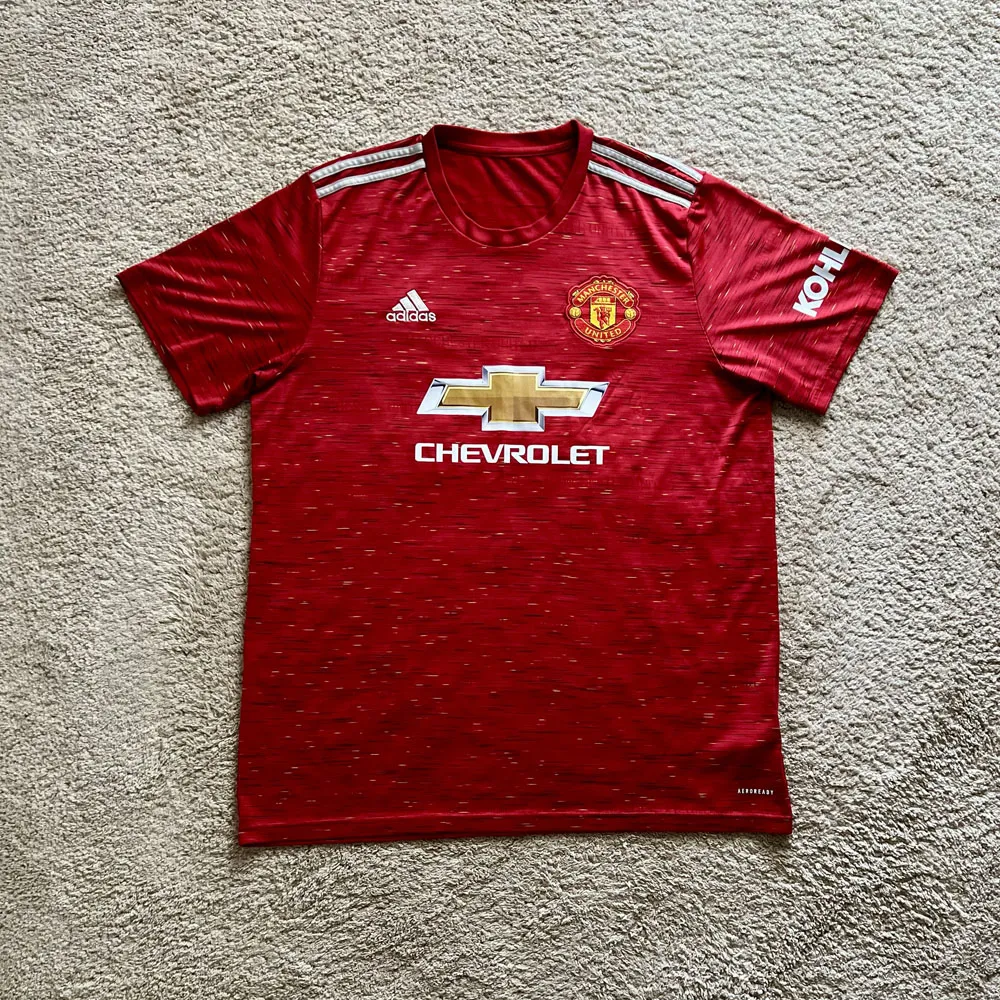 Front view of Manchester United 2020/21 Adidas Home Shirt (Chevrolet) - Men's XL