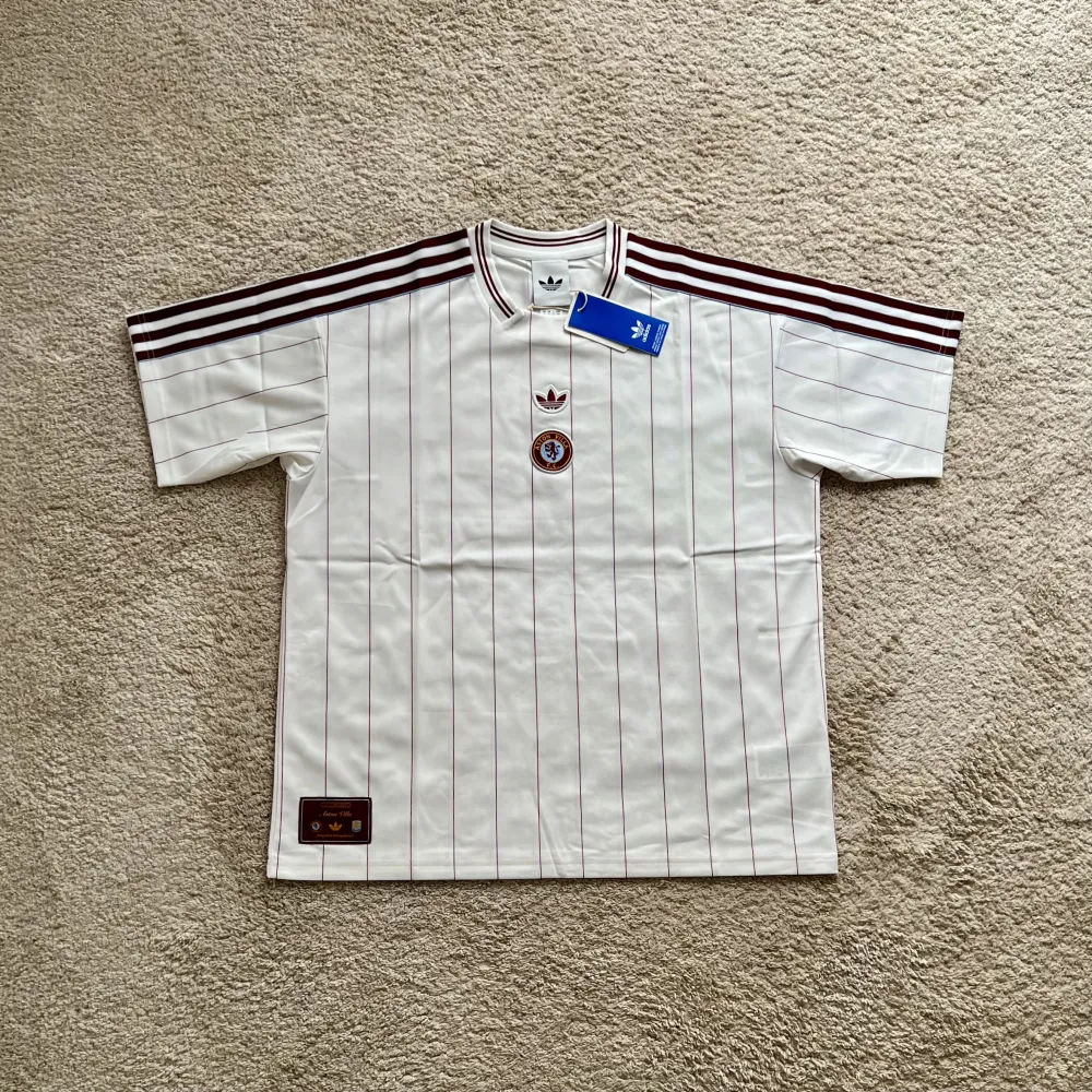 Front view of Aston Villa 2025/26 Adidas Travel 2 Shirt - Men's Medium