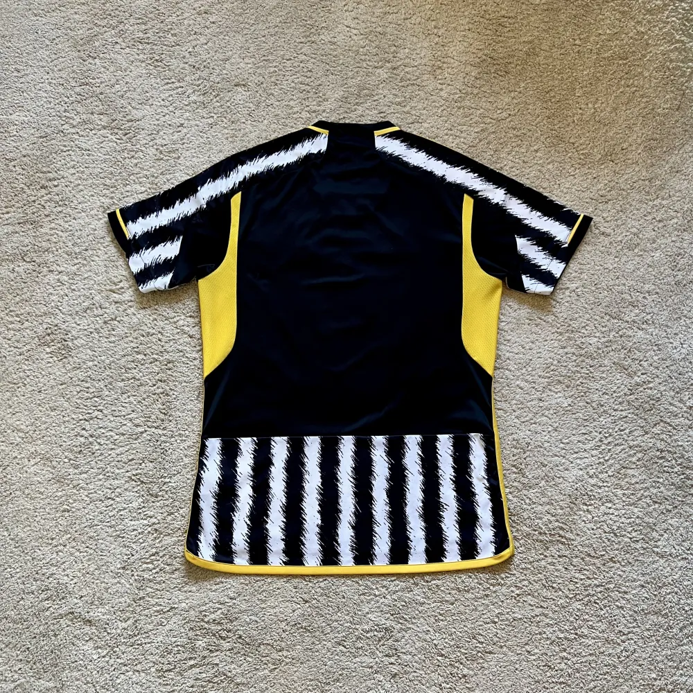 Rear view of Juventus 2023/24 Adidas Home Shirt (Jeep) - Men's Large