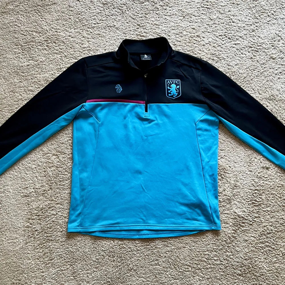 Front view of Aston Villa 2018/19 Luke 1977 Track 1/4 Zip Jacket - Men's Large