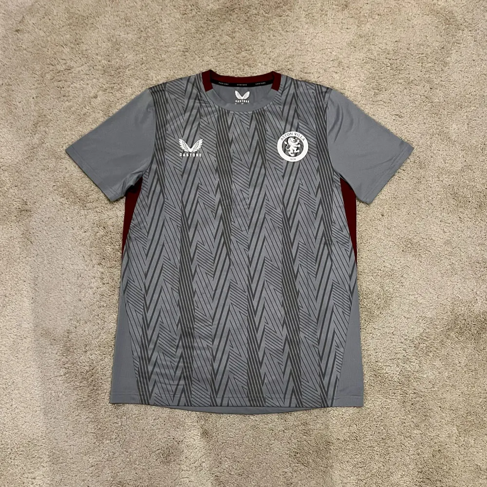 Front view of Aston Villa 2023/24 Castore Training Staff 2 Shirt - Men's Medium
