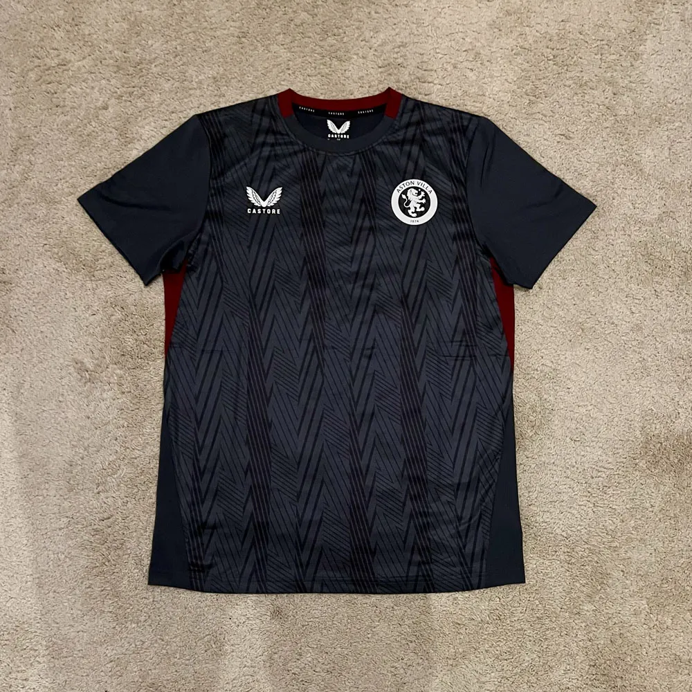 Front view of Aston Villa 2023/24 Castore Training Shirt - Men's Medium