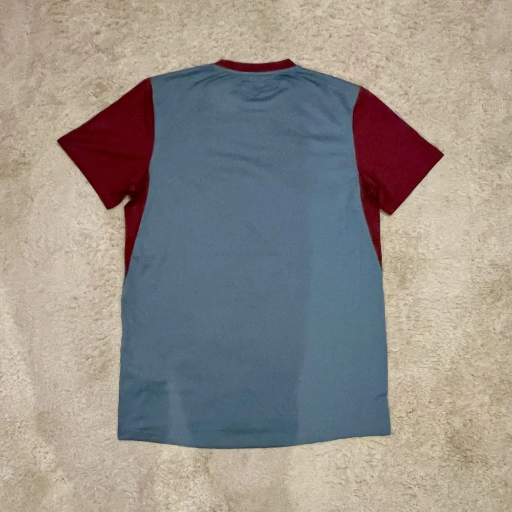 Rear view of Aston Villa 2023/24 Castore Training 1 Shirt - Men's Medium