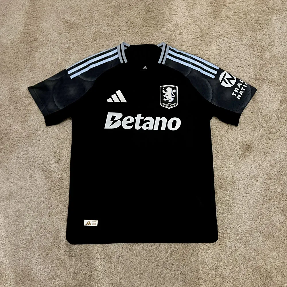 Front view of Aston Villa 2025/26 Adidas Away Shirt (Betano) - Men's Medium