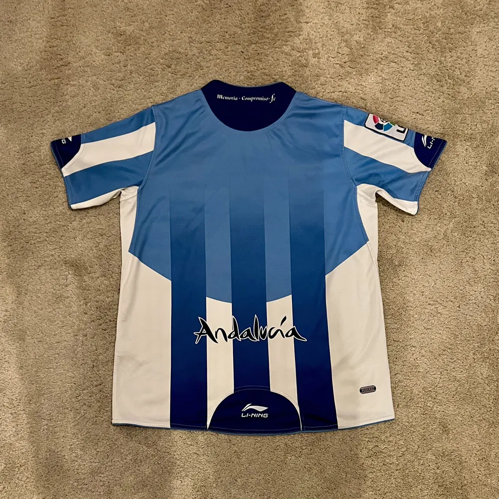 Rear view of Malaga CF 2010/11 Li-Ning Home Shirt - Men's Large
