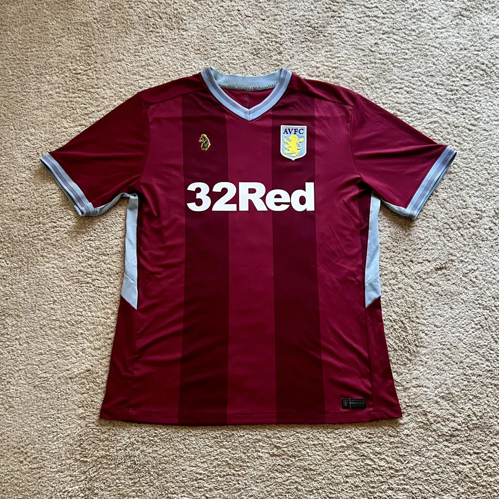 Front view of Aston Villa 2018/19 Luke 1977 Home Shirt (32Red) - Men's XL
