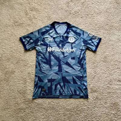 Front view of Aston Villa 2023/24 Castore 3rd Shirt (Aston Villa Foundation) - Men's Medium