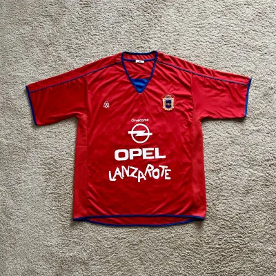 Front view of UD Lanzarote 2010-14 Home Shirt (Opel) - Men's Medium