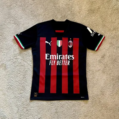 Front view of AC Milan 2022/23 Puma Home Shirt (Fly Emirates) - Men's Small
