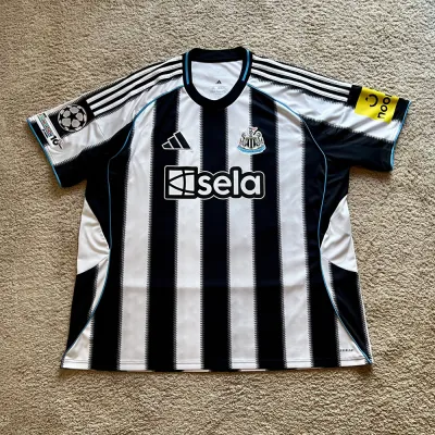 Front view of Newcastle United 2025/26 Adidas Home Shirt (Sela) - Men's 3XL